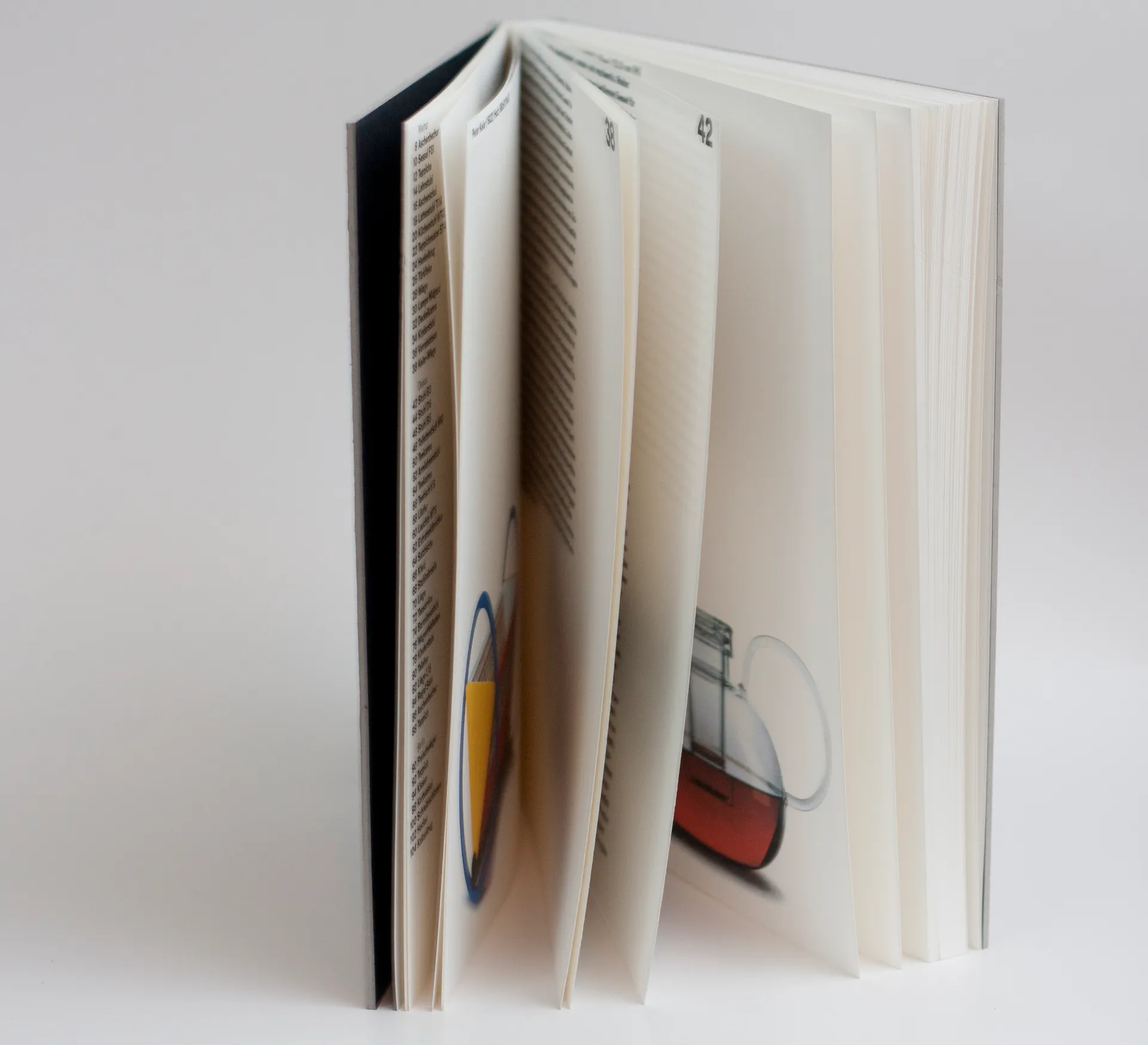 Open Bauhaus book showing a product image and editorial text