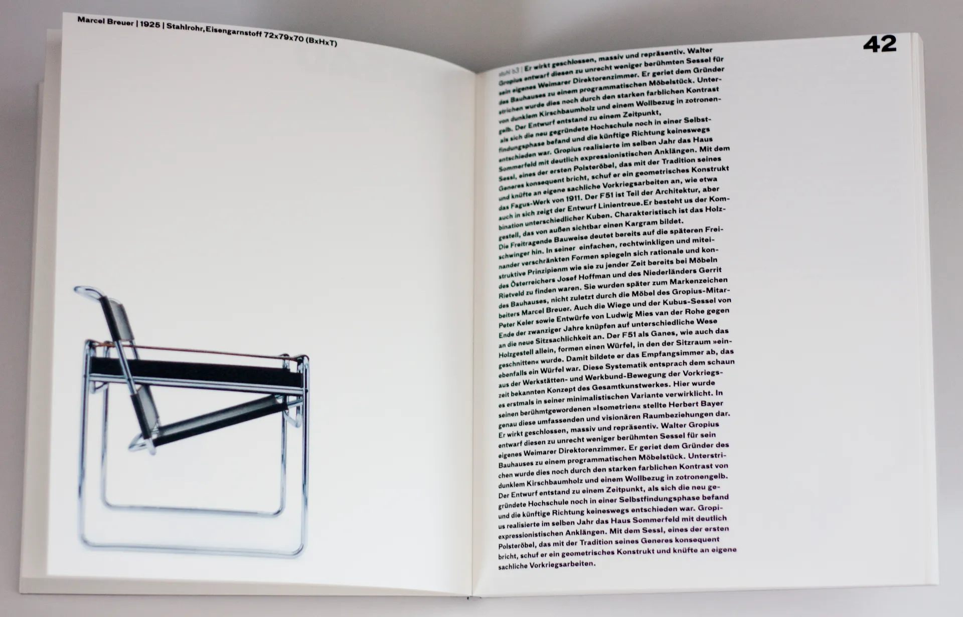 Open Bauhaus book showing a chair product image and editorial text